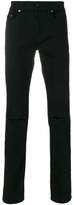 Thumbnail for your product : Saint Laurent busted knee slim fit jeans
