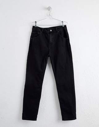ASOS DESIGN tapered jeans in black