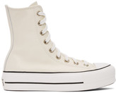 white leather converse with black stripe