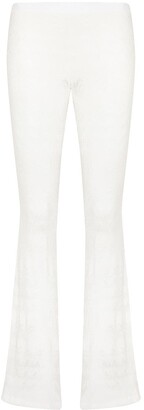 white linen flared trousers