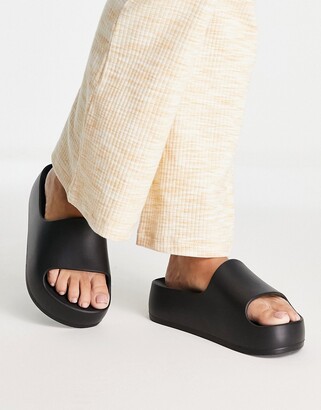 ASOS DESIGN Wide Fit Flare quilted sliders in black