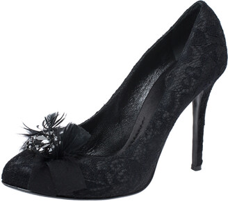 black pumps with feathers