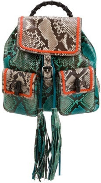Gucci Backpack Blue Python Animal Print Bamboo Accent Silver-Tone & Tonal Hardware Bamboo & Leather Trim Bamboo Handle & Dual Adjustable Shoulder Straps Leather, Braided & Tassel Accents Dual Exterior Pockets Leather Lining & Three Interior Pockets Drawstring Closure at Top & Buckle Closure at Front Includes Dust Bag Unfortunately, due to restrictions, this item may not be eligible for shipping in all areas.
