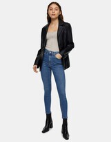 Thumbnail for your product : Topshop Jamie jeans with abraded hem detailing in mid blue
