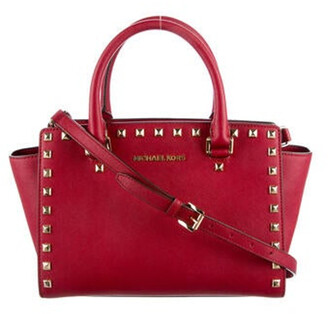 mk red sling bag