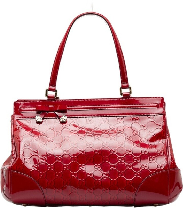 Ophidia boston patent leather handbag Gucci Brown in Patent leather -  30831920