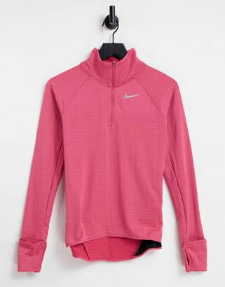 pink nike half zip top