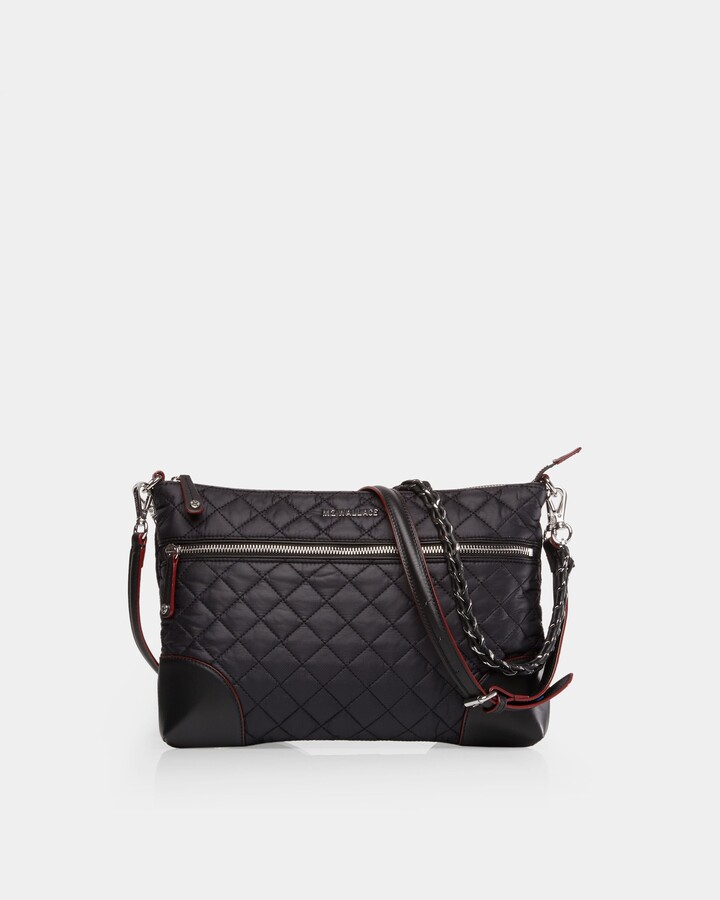 black crossbody bag with silver hardware