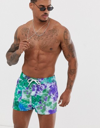 ASOS DESIGN swim shorts with purple tie dye in super short length