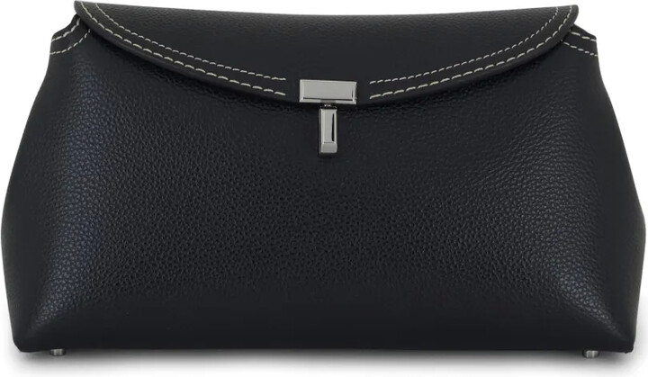 Totême T-Lock leather clutch bag
