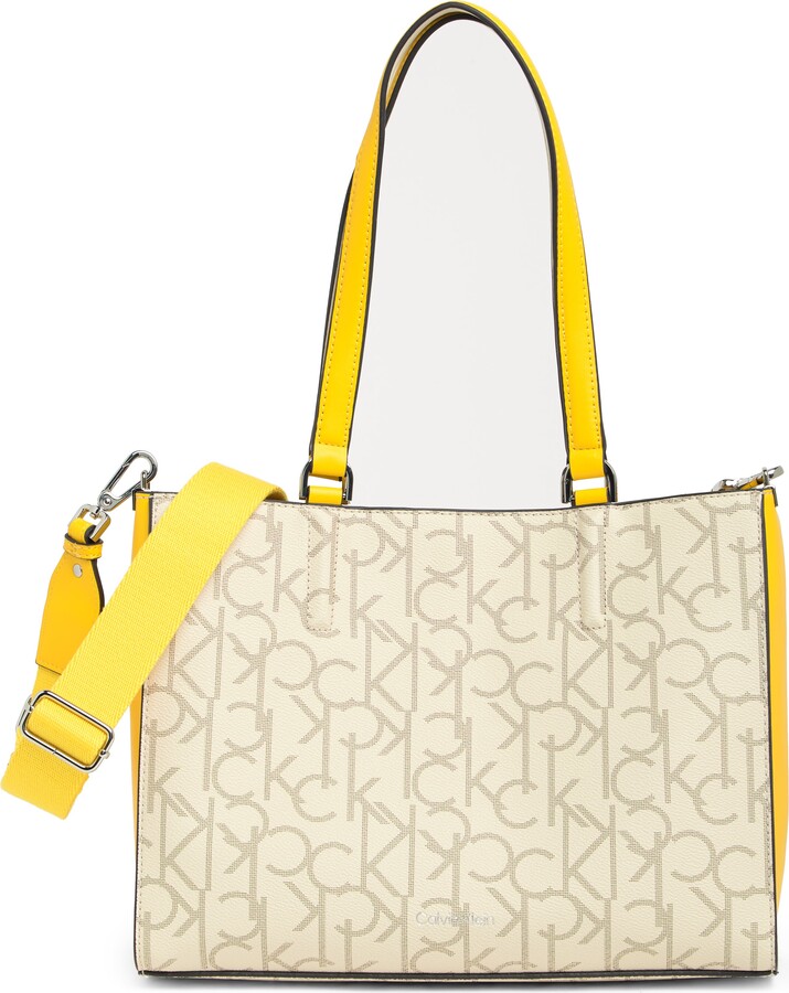 Calvin Klein Hadley Triple Compartment Crossbody, Almond/Taupe/Cherub  White/Dove: Handbags