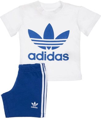 baby blue adidas shorts and shirt