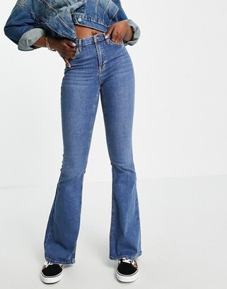 Omkreds dome Definition Topshop Tall Jamie flare jeans in mid blue - ShopStyle