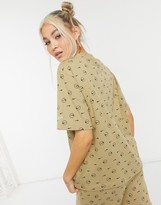 Thumbnail for your product : Nike all-over logo print boyfriend T-shirt in camel