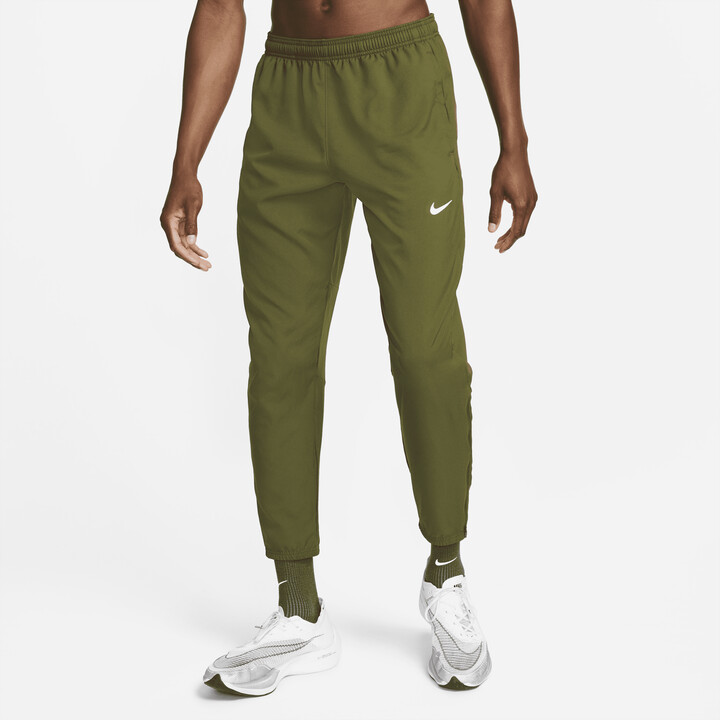 Nike Men's Dri-FIT Challenger Woven Running Pants in Green
