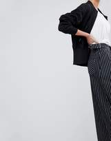 Thumbnail for your product : ASOS Balloon Leg Jeans In Mono Stripe With Twisted Seam Detail