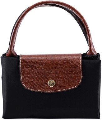 how to fold longchamp bag