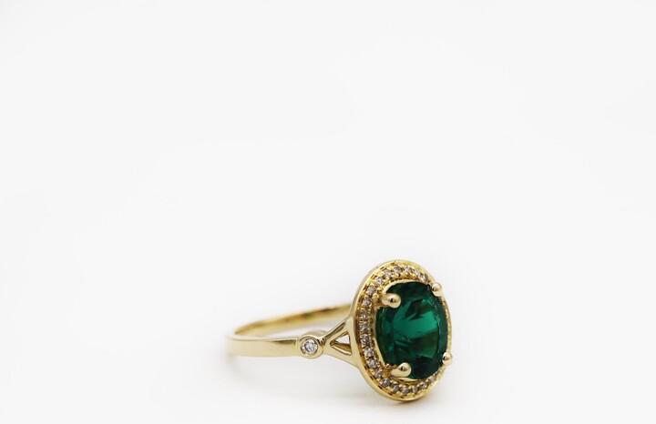 Dazzling Rock 14k Gold Lab Emerald Halo Ring