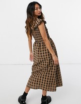 Thumbnail for your product : GHOSPELL sleeveless maxi dress with bib collar in brown check