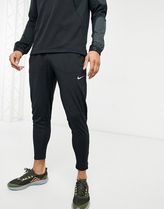 Nike Running Phenom joggers in black - ShopStyle Trousers