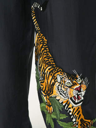MHI tiger embroidered track pants