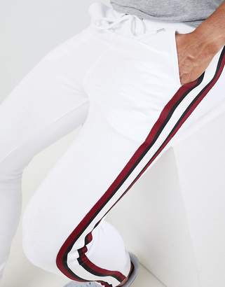 ASOS Design Super Skinny Jogger In White With Side Stripes