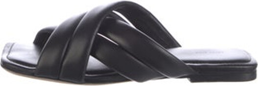 Anine Bing Leather Slides Black Crossover Straps Unfortunately, due to restrictions, this item may not be eligible for shipping in all areas.