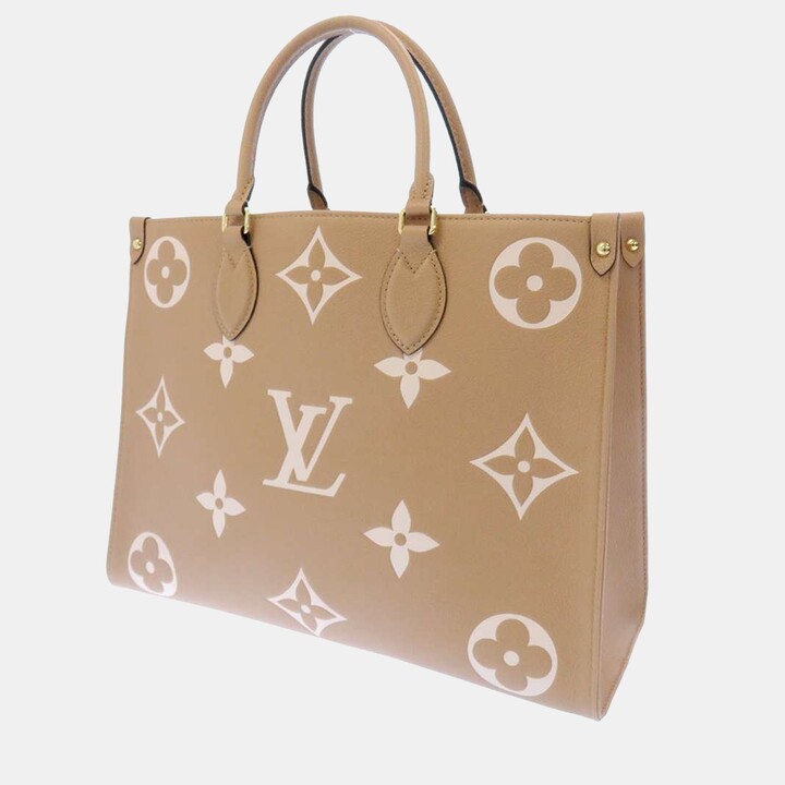 Louis Vuitton Beige Monogram Empreinte Leather Onthego MM - ShopStyle Tote  Bags