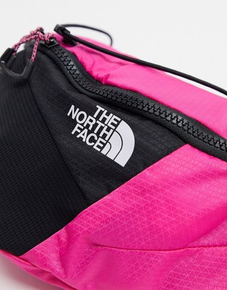 The North Face Lumbnical small bum bag in dark pink