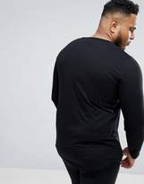 Thumbnail for your product : ASOS Plus Longline Long Sleeve T-Shirt With Curved Hem And Deep Contrast Lace Up V Neck