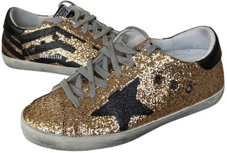 gold glitter tennis shoes