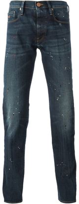 Emporio Armani paint splatter effect jeans