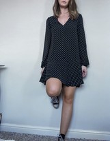 Thumbnail for your product : ASOS DESIGN long sleeve v neck mini dress with curved hem in mono spot