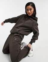 Thumbnail for your product : Nike metallic swoosh neutral trackies in dark brown