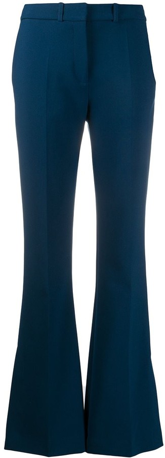 flared hem trousers