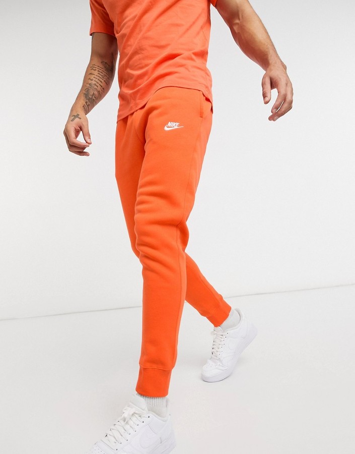 Nike Club cuffed sweatpants in orange - ShopStyle Activewear Pants