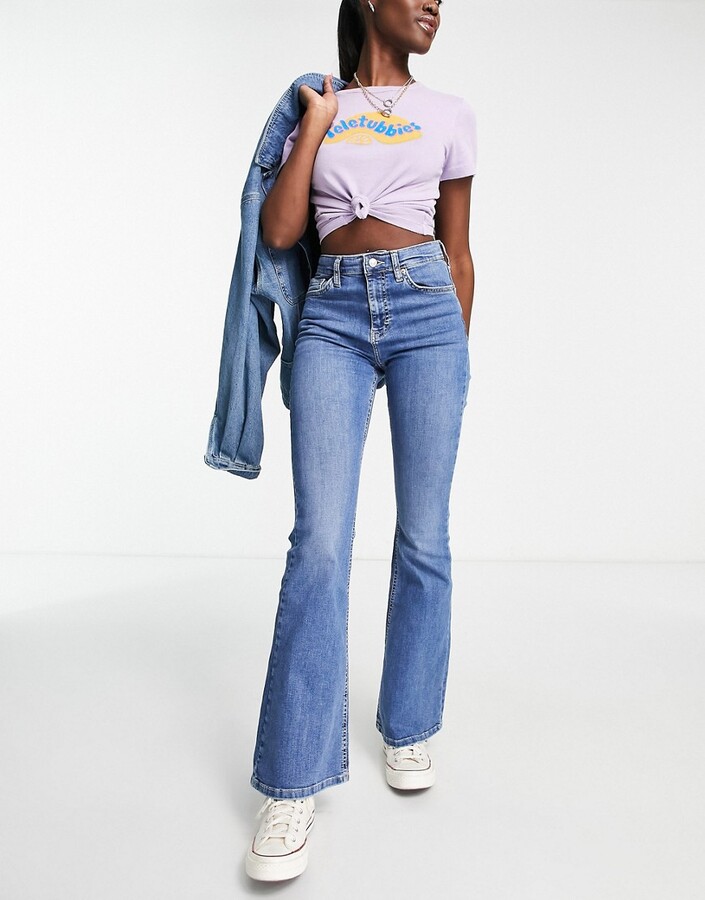 Topshop Jamie flare jeans in mid blue - ShopStyle