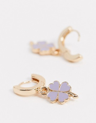 ASOS DESIGN hoop earrings with four leaf clover charm in gold tone