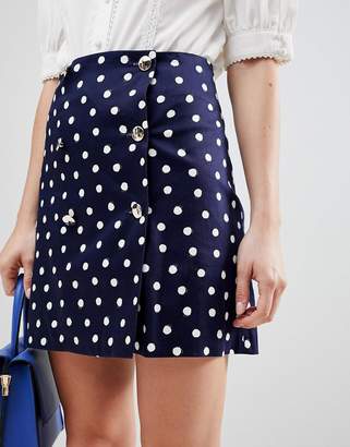 ASOS DESIGN double breasted mini skirt in spot
