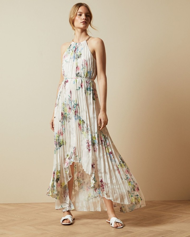 pleated dip hem dress