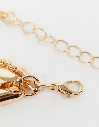 ASOS DESIGN multirow necklace with rope chain and t bar in gold tone