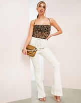 Thumbnail for your product : ASOS DESIGN Hourglass flared jean with lace up front in ecru