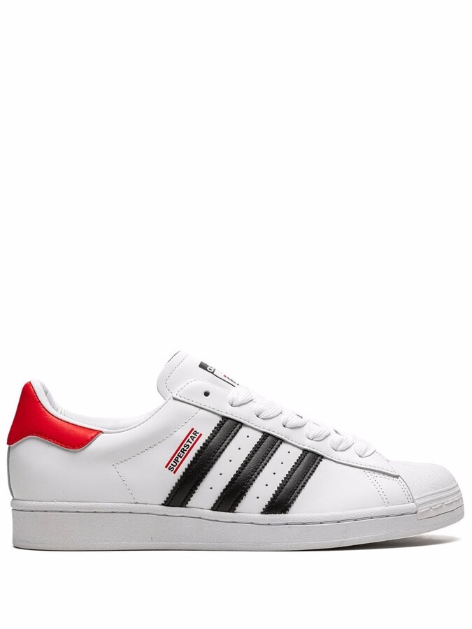 shell toe adidas black and red