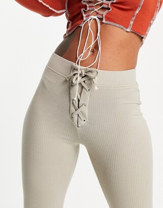 ASOS DESIGN rib kick flare pants with lace-up waist in taupe - ShopStyle