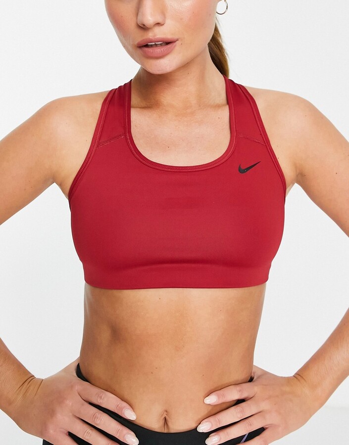 Nike Training swoosh non padded medium support sports bra in red - ShopStyle