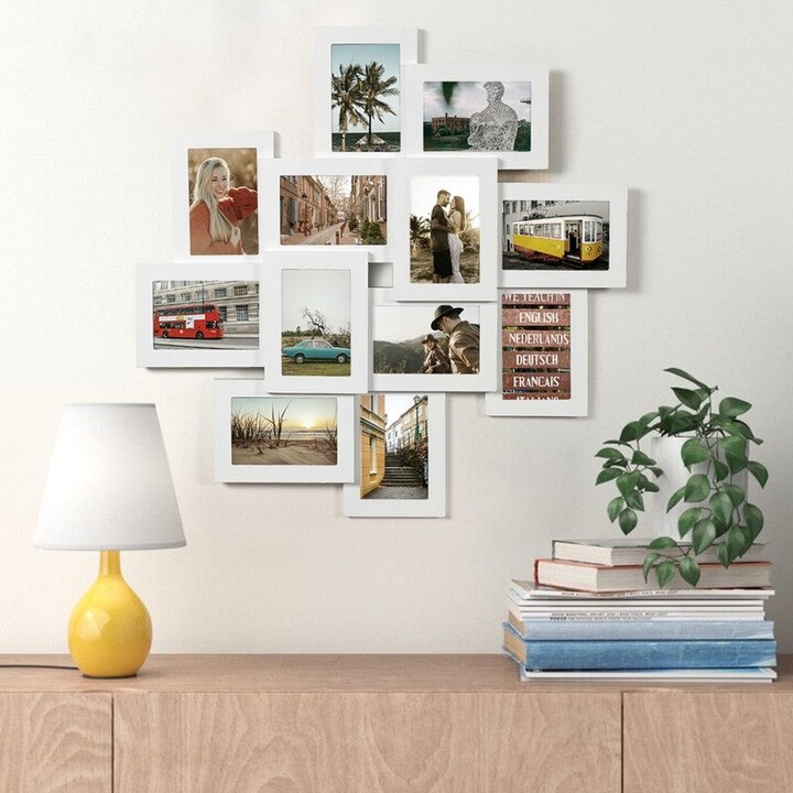 https://img.shopstyle-cdn.com/sim/1d/af/1dafb60a71754c7612c0630d5b0d6a55_best/adeco-decorative-wood-wall-hanging-photo-frame-12-4-x-6-inch-openings.jpg