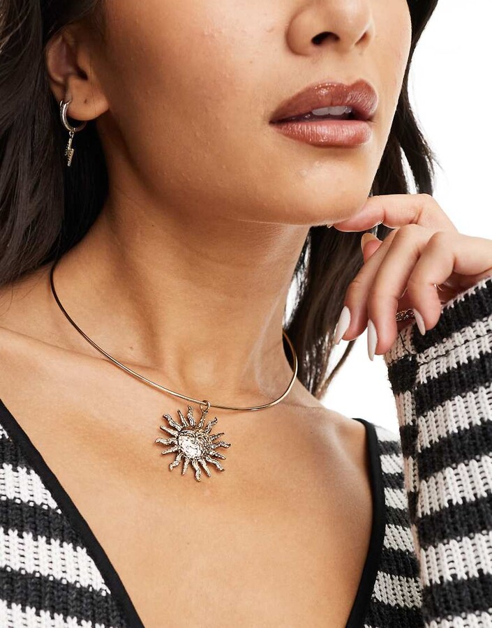 Reclaimed Vintage choker necklace with sun pendant in gold ShopStyle