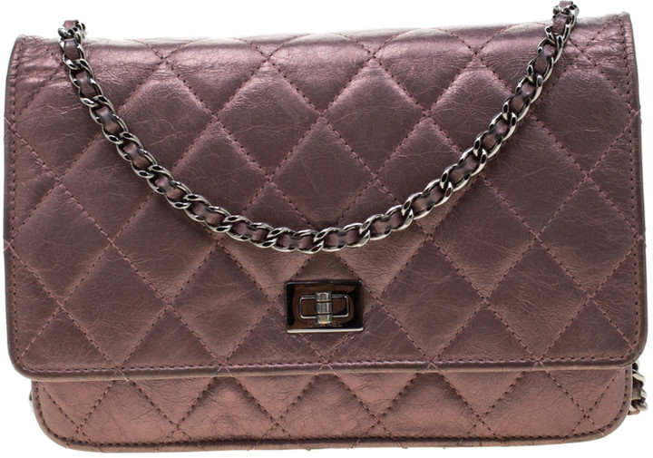 metallic pink clutch bag