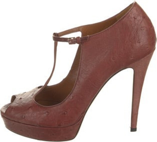 Gucci Ostrich T-Strap Pumps Brown Peep-Toes Platform Mary Jane Strap & Buckle Closure at Ankles Unfortunately due to restrictions this item may not be eligible for shipping in all areas.