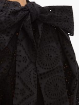 Thumbnail for your product : Ganni Tie-neck Broderie-anglaise Cotton Blouse - Black